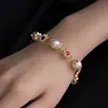 Colar e Pulseira Hip-Hop de Design Nicho com Flor de Pérola para Homens e Mulheres, Corrente Clavicular de Personalidade Moderna e Descolada de Alta Qualidade