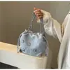 Bolsas Populares deste Ano para Mulheres 2024 Novo Verão Popular Balde Borboleta Estilo Western de Alta Qualidade Bolsa Transversal com Corrente