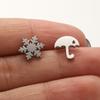 Pendientes de Paraguas de Copo de Nieve Asimétricos Diseño de Nicho Invierno 2025 Acero Inoxidable Perforación de Hélice Personalizada Accesorios de Moda