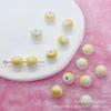 Cuentas sueltas de color cerámico Yiwu diy tejido a mano collar de tres vías pulsera accesorios de joyería con cuentas venta al por mayor