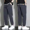 Pantalones transfronterizos de seda de hielo, estilo fino de verano para hombre, moda coreana, modernos, corte holgado, con etiqueta, tobillo cónico, pantalones casuales