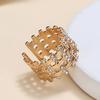 Tendencia europea y americana personalidad hip-hop moda apertura ajustable anillo trenzado de diamantes completos raya vertical hueco anillo de tres capas