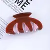 Pinza de Garra Hueca de Tres Puntas Color Sólido Brillante Pinza de Tiburón Grande de Color Contrastante Macaron Accesorio Simple Versátil para Peinar el Cabello Venta al por Mayor
