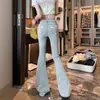 Jeans de Cuerno Micro con Lazo para Mujer Otoño Azul Ajustados a la Cadera Pantalones de Herradura Cintura Alta Adelgazantes Pantalones de Piso