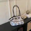 Nova Bolsa de Mão Portátil Fofa Outono/Inverno 2025 Bolsa de Mão de Maquiagem Elegante da Moda Tendência Bolsa de Ombro Simples de Nicho