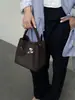 Bolso Cubo Texturizado Estilo Coreano Principios de Otoño para Mujer 2025 Nuevo Popular Bolso de Mano Elegante Estilo Extranjero Versátil para Viajar y Uso Diario Bolso Cruzado