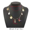 N12892 Moda Nueva Transfronteriza Flor de Mariposa Multi-Colgante Collar Diseño Simple Retro Collar de Aleación para Mujeres