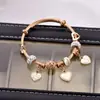 Exportación Transfronteriza Más Vendido 2025 Panjia Nuevo Bronce Lujo Accesible Encaje Corazón DIY Pulsera de Cuentas Joyería
