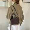 Bolso de mano tipo cubo retro de lujo simple transfronterizo Japón Corea para mujer Otoño Elegante Versátil para el trabajo Hombro único Cruzado