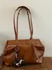 A nova bolsa tote de grande capacidade de Shuai Mi, uma bolsa de ombro casual e estilosa, uma bolsa de axila moderna e fashion