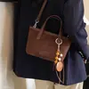 Bolso de Hombro Cruzado Retro Coreano para Mujer 2026 Moderno Nuevo de un Solo Hombro Otoño Terciopelo Gamuza Versátil Nicho para Viajes Diarios