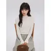 Top de punto amarillo de cuello medio alto para mujer, suéter de otoño e invierno