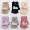 Luvas femininas de inverno 2025 para estudantes, modelo flip-finger, meio dedo, fofas, coreanas, com desenho animado, quentes, de veludo, fabricadas e vendidas por atacado.