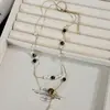 Collar de Calabaza con Piedra Ojo de Tigre de Doble Capa para Mujer 2026 Nuevo de Moda Lujo Ligero Gama Alta Cadena de Suéter con Cuentas Nicho Moda