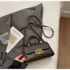 Bolso de Mano Cuadrado Pequeño Retro de Alta Gama de Moda Transfronterizo para Mujer Modelo Nuevo 2026 Bolso de Hombro Cruzado de Gran Capacidad Versátil