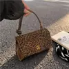 Bolso de mano de cuero encerado brillante de moda nicho para mujer, nuevo 2026 primavera versátil casual de cuero suave para hombro y bandolera