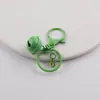 Macaron Pintura Campana Juego de Tres Piezas Cadena Colgante DIY Bolso Hecho a Mano Colgante de Muñeca Material para Joyería Accesorios