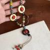 Colar de pingente de sino de borboleta de cerâmica estilo étnico vintage Acessórios femininos 2023 Nova Moda Longa Cadeia de Cerâmica
