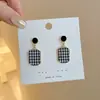 Pendientes combinables puesto de mercado nocturno al por mayor Corea del Sur pendientes explosivos simples diseño de nicho femenino pendientes de moda con temperamento