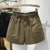 Calças casuais largas de cintura alta brancas são adequadas para mulheres de meia-idade e idosas, oferecendo um design confortável e elegante