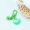 Nuevo Estilo Cortado Cara Amor Llavero Colgante Color Caramelo Campana Accesorios DIY Bolso de Pareja Auriculares Colgante Accesorios