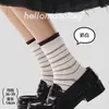 Calcetines de otoño e invierno para mujer con rayas de colores contrastantes, bordes enrollados estilo ins, calcetines apilados vintage, calcetines de media pantorrilla, sin costuras, versátiles, tendencia universitaria