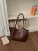 Bolso de mano simple de gran capacidad transfronterizo, textura versátil, bolsa tote, sensación de alta gama, nicho, apariencia retro, bolso de hombro único