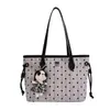 Bolso de mano elegante y de alta gama de gran capacidad para mujer, nueva colección 2026, adecuado para el trabajo diario, con diseño de lunares y rayas, y se puede llevar como bolso de hombro o bolso tote