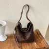 Bolso de Mano Estampado de Leopardo Retro Bolso de Gran Capacidad para Mujer Nuevo Tendencia 2026 Otoño Nicho Bolso Cubo de Hombro Cruzado