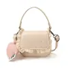 Bolsa de Mão Pequena Doce e Fofa Estilo Coreano para Mulheres 2025 Inverno Nova Bolsa Transversal Estilo Creme Fresco com Borda de Renda