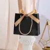 Caja de regalo de cumpleaños europea transfronteriza cartón en blanco caja de dulces Mori bolsa de regalo pequeña para fiesta bolsa de regalo caja de regalo al por mayor