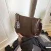 2026 Otoño e Invierno Nuevo de Moda de Gama Alta Diseño de Nicho Simple Casual Texturizado Bolso de Hombro Cruzado Bolso de Mano Transfronterizo