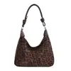 Bolso retro tipo dumpling coreano para mujer, nueva colección de otoño 2026, bolso de hombro de gamuza de gran capacidad, versátil y adecuado para ir al trabajo, bolso cruzado