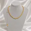 Estilo de vacaciones de playa simple transfronterizo europeo y americano, perla de imitación, personalidad hecha a mano, cadena trasera con borla sexy temperamental