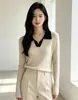 Fábrica de Suéteres Fuente Dalan: Suéter de punto para mujer de otoño e invierno con cuello, tejido de ochos y colores contrastantes, top interior adelgazante, venta al por mayor y hecho a medida