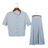 Conjunto de dos piezas de punto trenzado calado para mujer con cuello ondulado, cárdigan de manga corta, falda midi de cintura alta y atuendo estilo Chanel