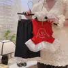 Estilo de ocio modal fino de verano para mujer con lunares versión coreana de traje para mujer tesoro de verano niñas top al por mayor