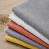 Venta especial de fábrica precio especial tela tipo lino algodón lino lino fino cojín de sofá cojín decorativo mantel bolsa de sal tela para equipaje