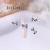 Acessórios de Liga de Borboleta para Nail Art, Populares nas Redes Sociais, Decorações de Unha 3D Prata Líquido Vazado Laço