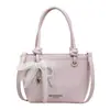 Bolso Cubo Portátil Simple Transfronterizo para Mujer 2026 Nuevo Bolso de Hombro Versátil Casual para Viajar y Uso Cruzado