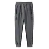 2026 Nova Marca Moderna de Quatro Estações Clássico Versátil Esportivo Masculino Bolso com Zíper Estilo Coreano Calça Casual Moderna com Forro de Fleece