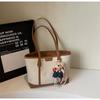 Bolsa Grande de Couro Estilo Coreano para Mulheres 2025 Verão Nova Casual Simples Bolsa de Ombro para Trabalho e Deslocamento Bolsa Tote