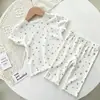 2026 Nuevo Conjunto de Verano Estilo Coreano Nuevo de Manga Corta y Pantalón Largo para Niñas Conjunto Floral Pequeño Fresco Bebé Hogar