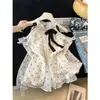 Blusa de gasa de manga larga con lunares estilo francés, cuello halter y perlas para mujer, modelo nuevo 2026, top holgado de hombros descubiertos, color albaricoque, otros