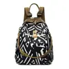 Mochila de Tecido de Nylon para Mulheres Estilo Coreano Nova Moda Versátil e Atmosférica Bolsa Casual de Nylon para Mulheres Mochila de Viagem de Grande Capacidade