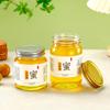 Frasco hermético doméstico con tapa frasco de almacenamiento botella de miel tapa de aluminio frasco de vidrio para crema de limón ungüento chino crema Guiling crema de pera de otoño