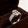Comércio Exterior Anel Fechado Pedra Grande Nuia Cheia de Diamante Anel Clássico de Três Peças Cheio de Diamante Anel de Noivado Oval Zircônia