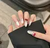 Uñas Portátiles de Alta Gama para Año Nuevo: Rojo Retro Cisne Puntos, Ojo de Gato Francés, Moño, Brillo Deslumbrante, Manicura Hecha a Mano que Realza el Cutis
