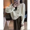 Suéter cárdigan dulce de color puro estilo coreano para mujer 2025 Otoño Nuevo de un solo botón Versátil Simple Suave Tejido tipo cera Chaqueta