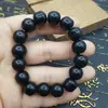 Pulsera de obsidiana cuentas de vidrio negro anillo único pulsera de cuentas de Buda decoración de mano para hombres y mujeres suministro de puesto de lugar escénico venta al por mayor